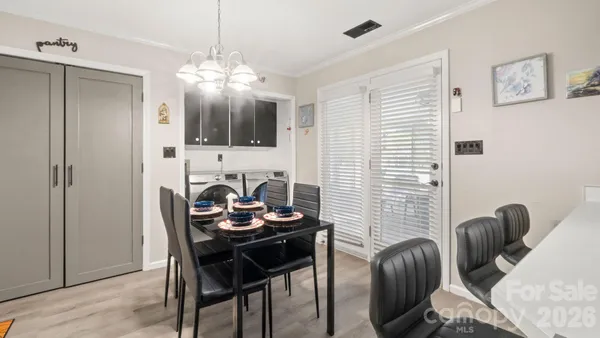 a view of a livingroom with furniture and window