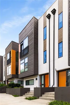 a front view of a multi story residential apartment building