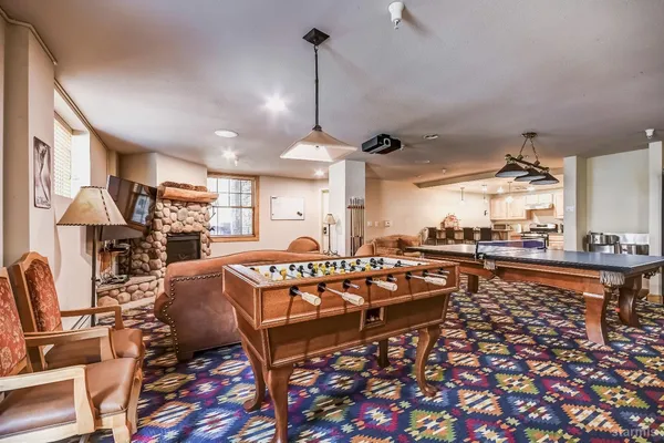 a view of a living room and dining room