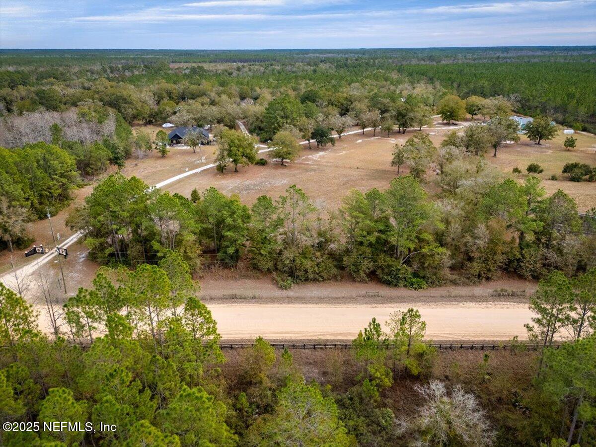 1 Hogarth Road Green Cove Springs, FL 32043 - Photo 13 of 28 a view of a lake with mountains and a yard