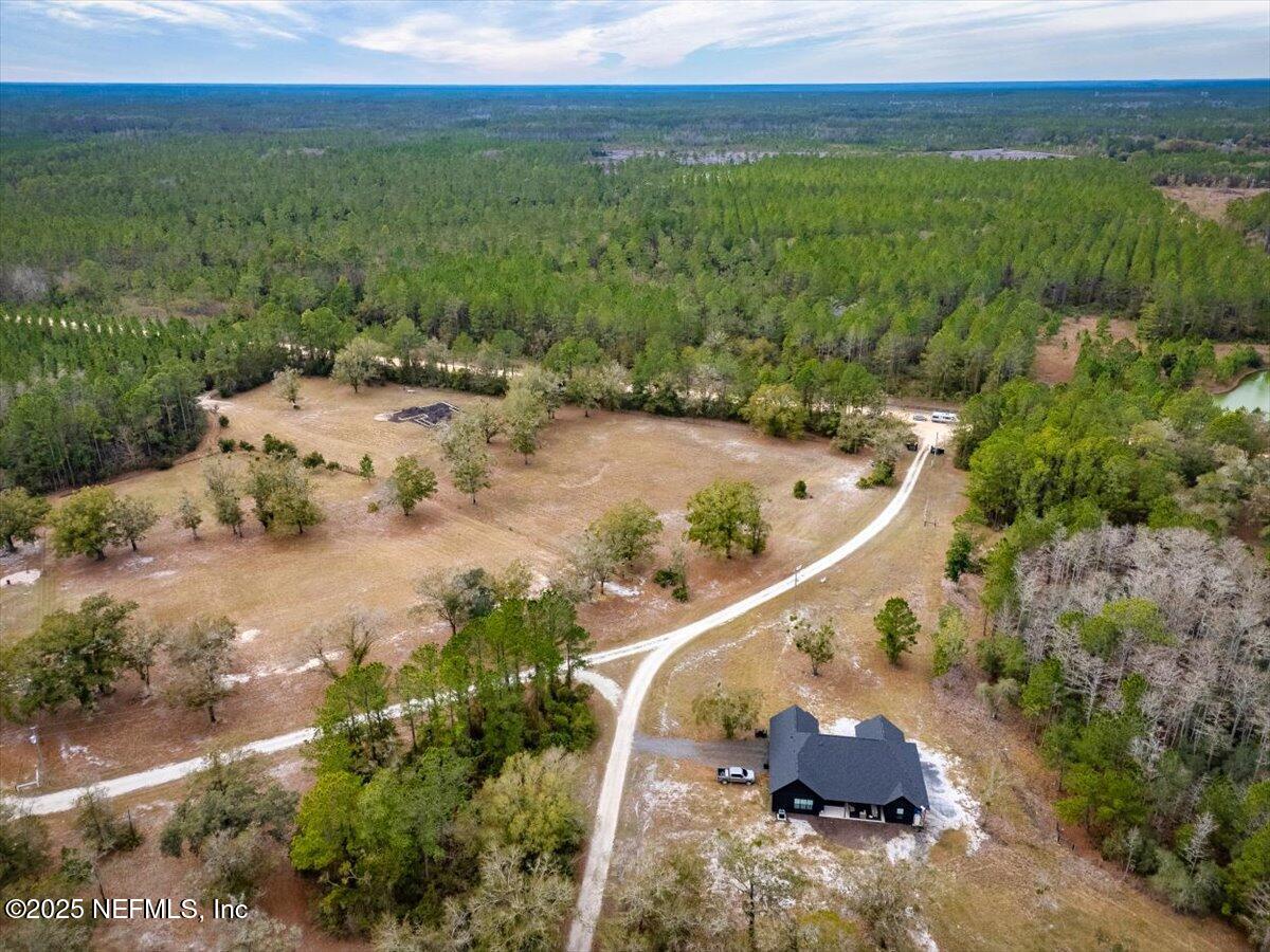 1 Hogarth Road Green Cove Springs, FL 32043 - Photo 23 of 28 aerial view of a house with a yard