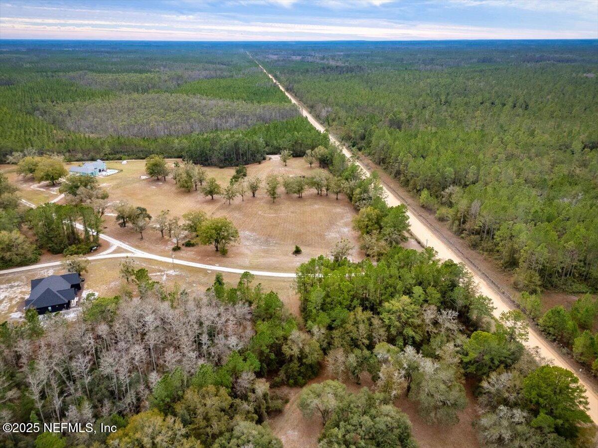 1 Hogarth Road Green Cove Springs, FL 32043 - Photo 24 of 28 a view of a lake with a yard