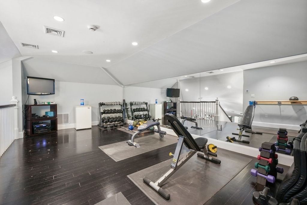 427 Hillside Street Milton, MA 02186 - Photo 28 of 42 a view of a room with gym equipment