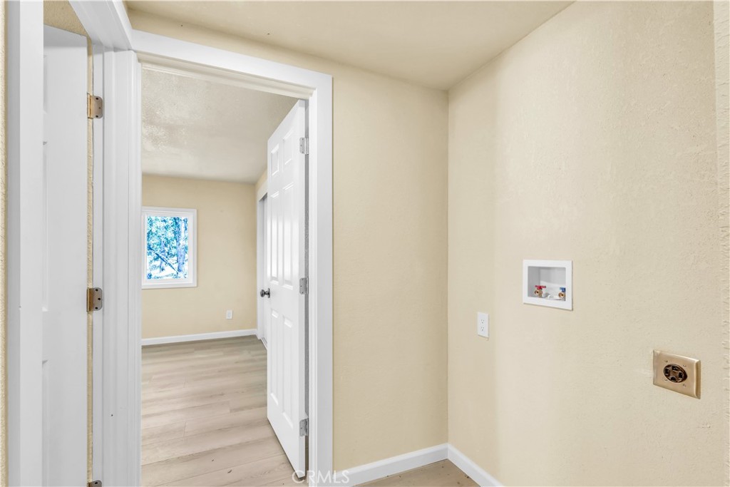 15905 Kugelman Street Lower Lake, CA 95457 - Photo 22 of 75 a view of a hallway with wooden floor