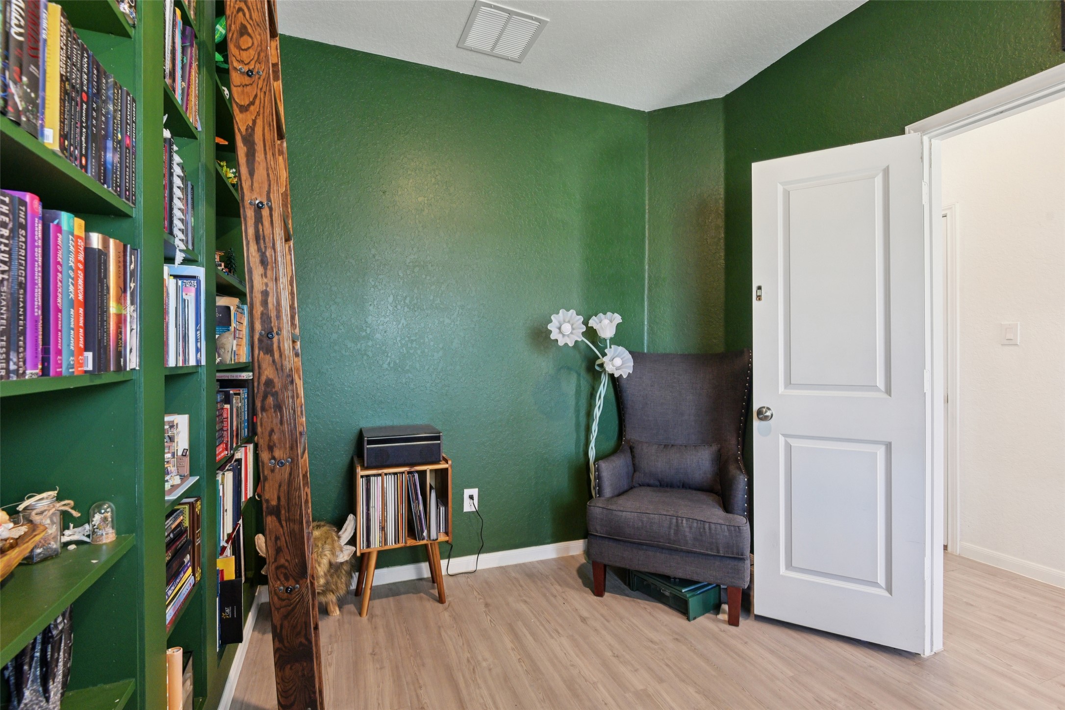 9058 Bowie Ridge Seguin, TX 78155 - Photo 12 of 40 Sitting room with light wood-type flooring and baseboards