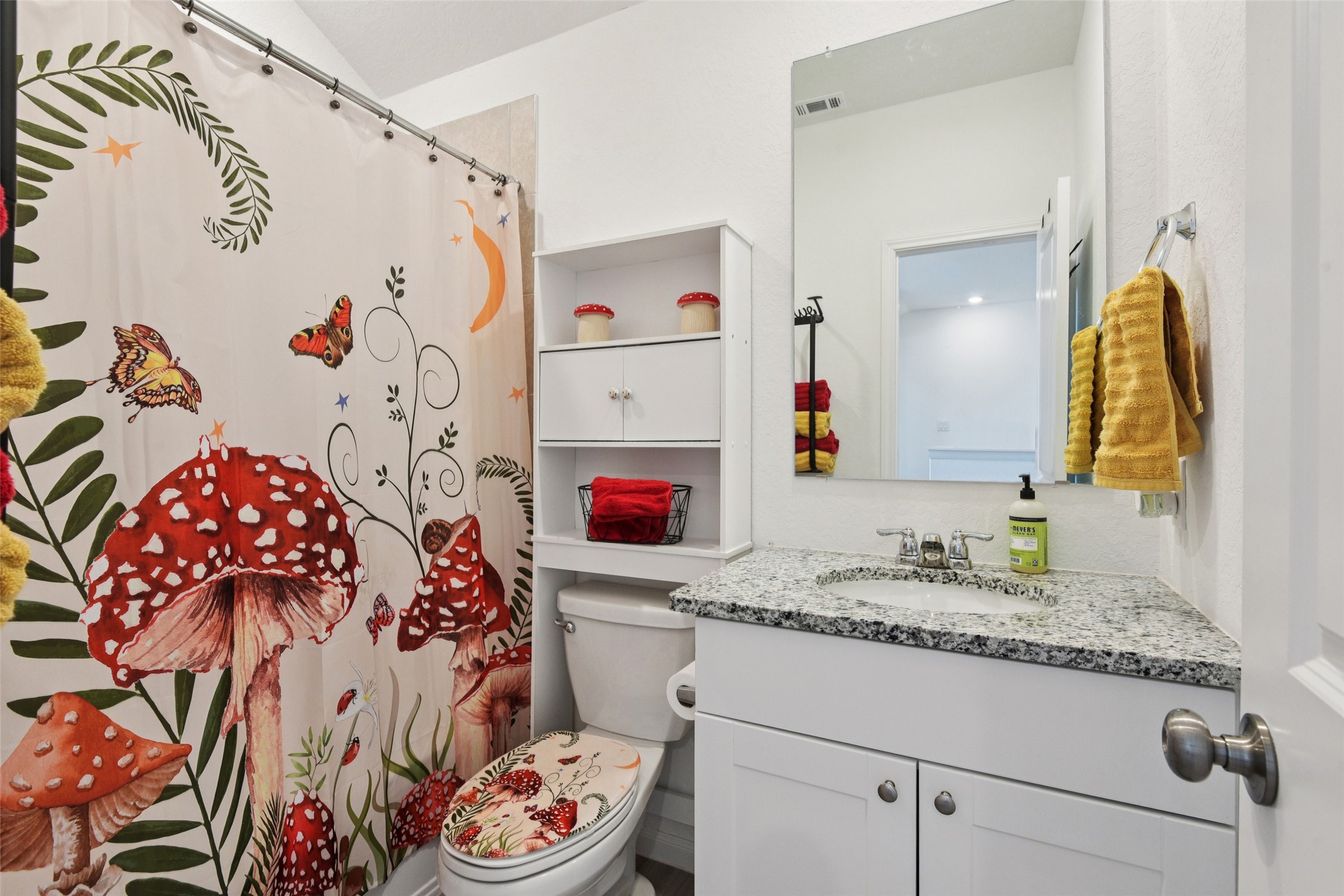 9058 Bowie Ridge Seguin, TX 78155 - Photo 27 of 40 Bathroom featuring a shower with curtain and vanity