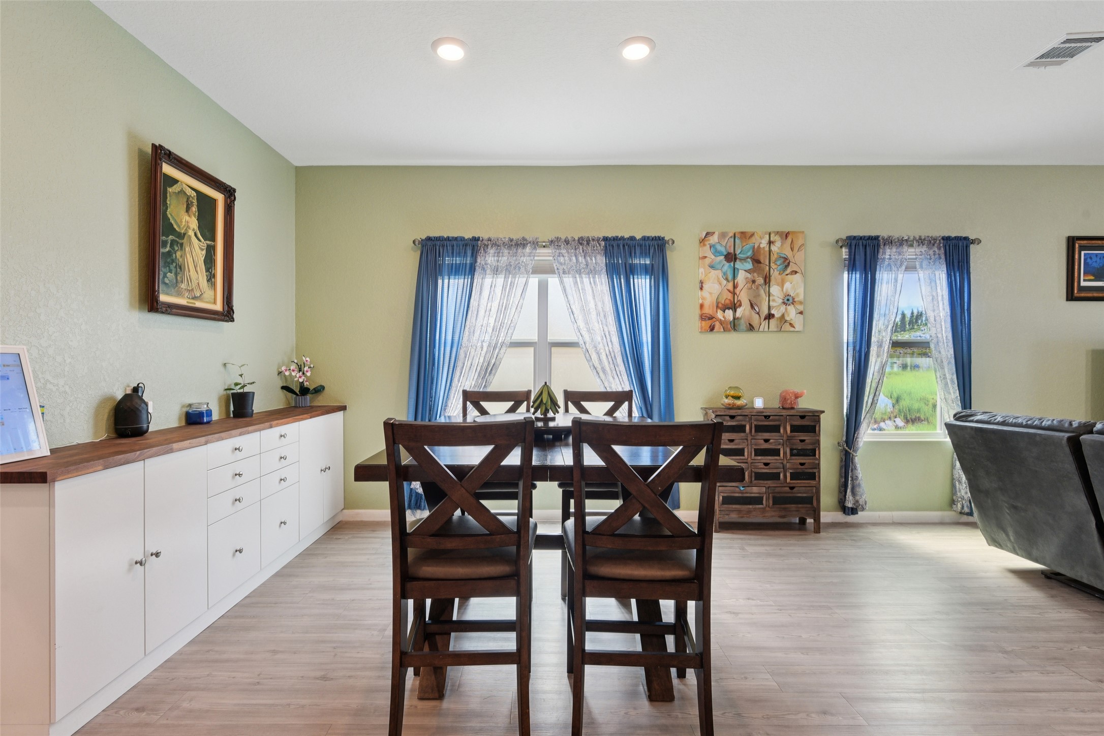 9058 Bowie Ridge Seguin, TX 78155 - Photo 3 of 40 Dining area with light wood-style flooring and plenty of natural light