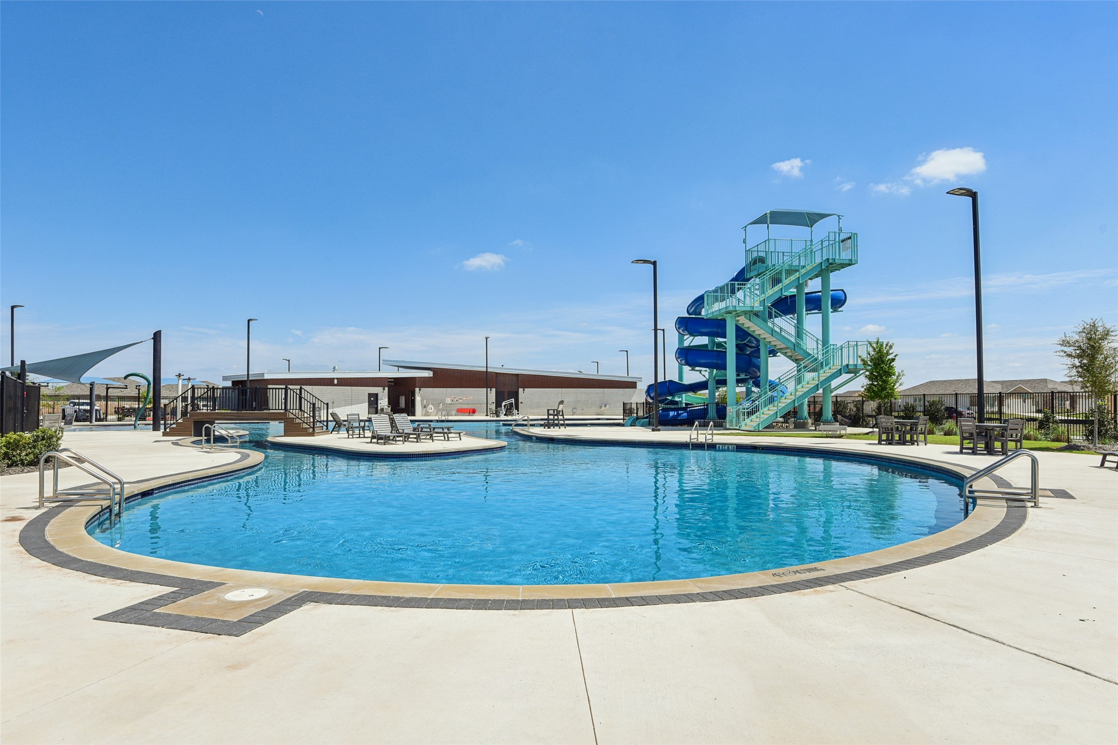 9058 Bowie Ridge Seguin, TX 78155 - Photo 37 of 40 Community pool featuring a patio and a water slide