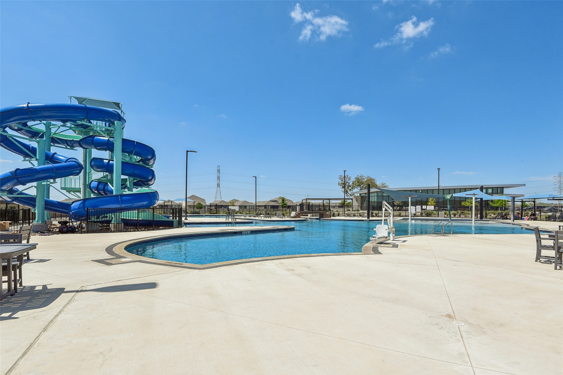 9058 Bowie Ridge Seguin, TX 78155 - Photo 38 of 40 Community pool featuring a patio and a water slide