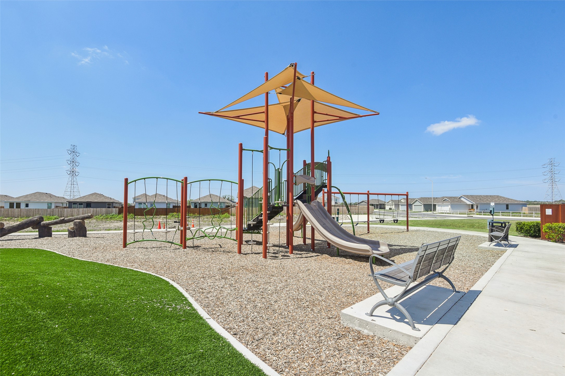 9058 Bowie Ridge Seguin, TX 78155 - Photo 39 of 40 Community playground with a residential view and a lawn