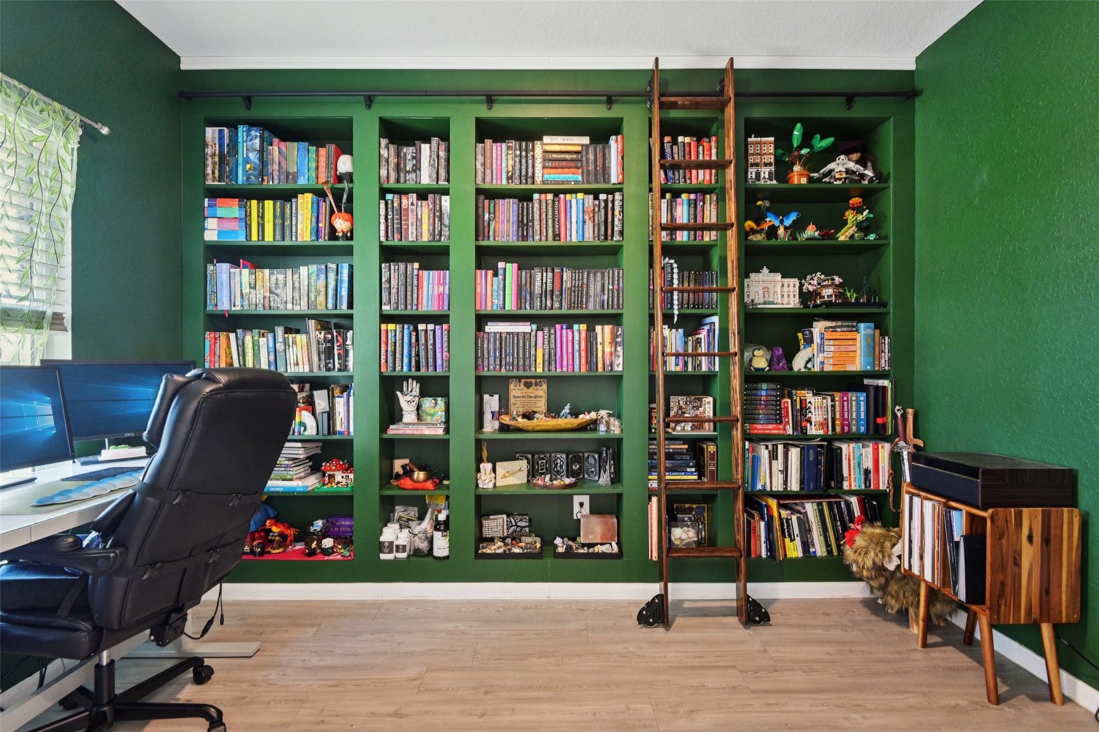 9058 Bowie Ridge Seguin, TX 78155 - Photo 6 of 40 Office area featuring light wood-style flooring and wall of books