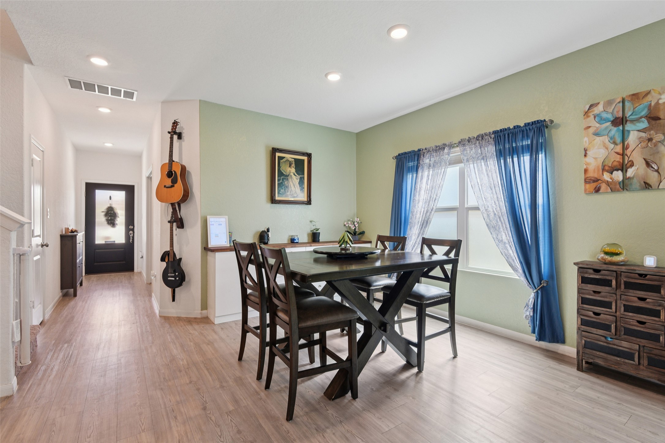 9058 Bowie Ridge Seguin, TX 78155 - Photo 7 of 40 Dining area with light wood finished floors and recessed lighting