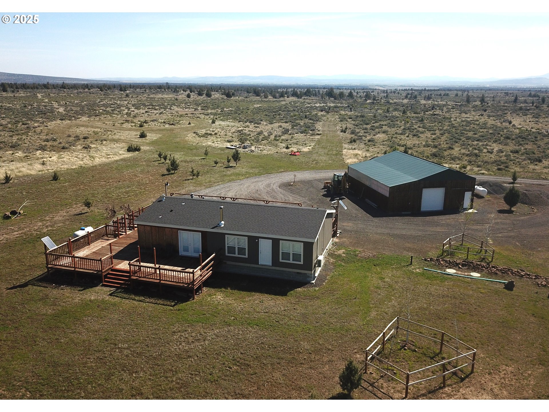 10500 Southwest Graham Road Culver, OR 97734 - Photo 1 of 34 an aerial view of residential houses with outdoor space