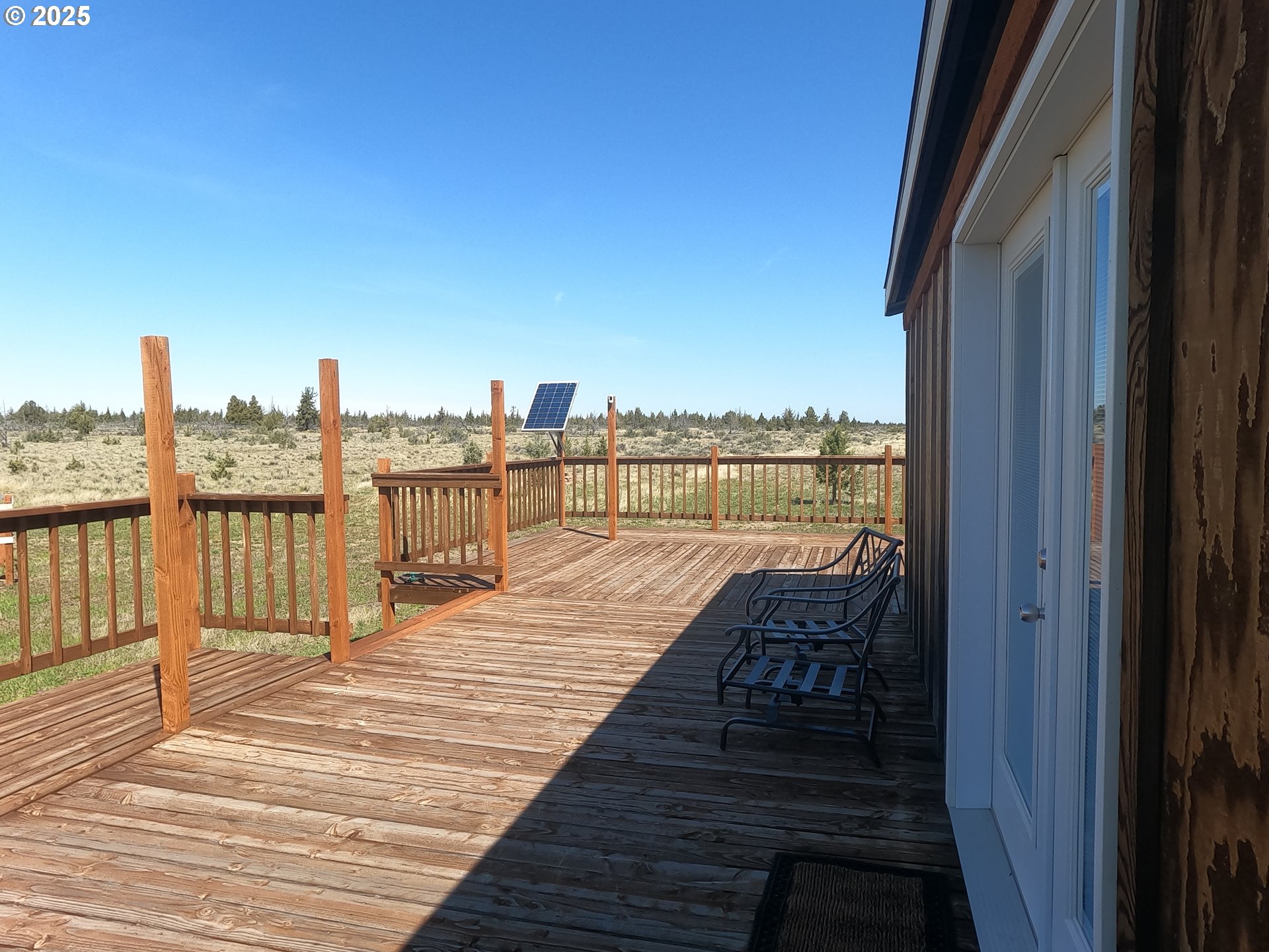 10500 Southwest Graham Road Culver, OR 97734 - Photo 13 of 34 a view of a balcony with wooden floor