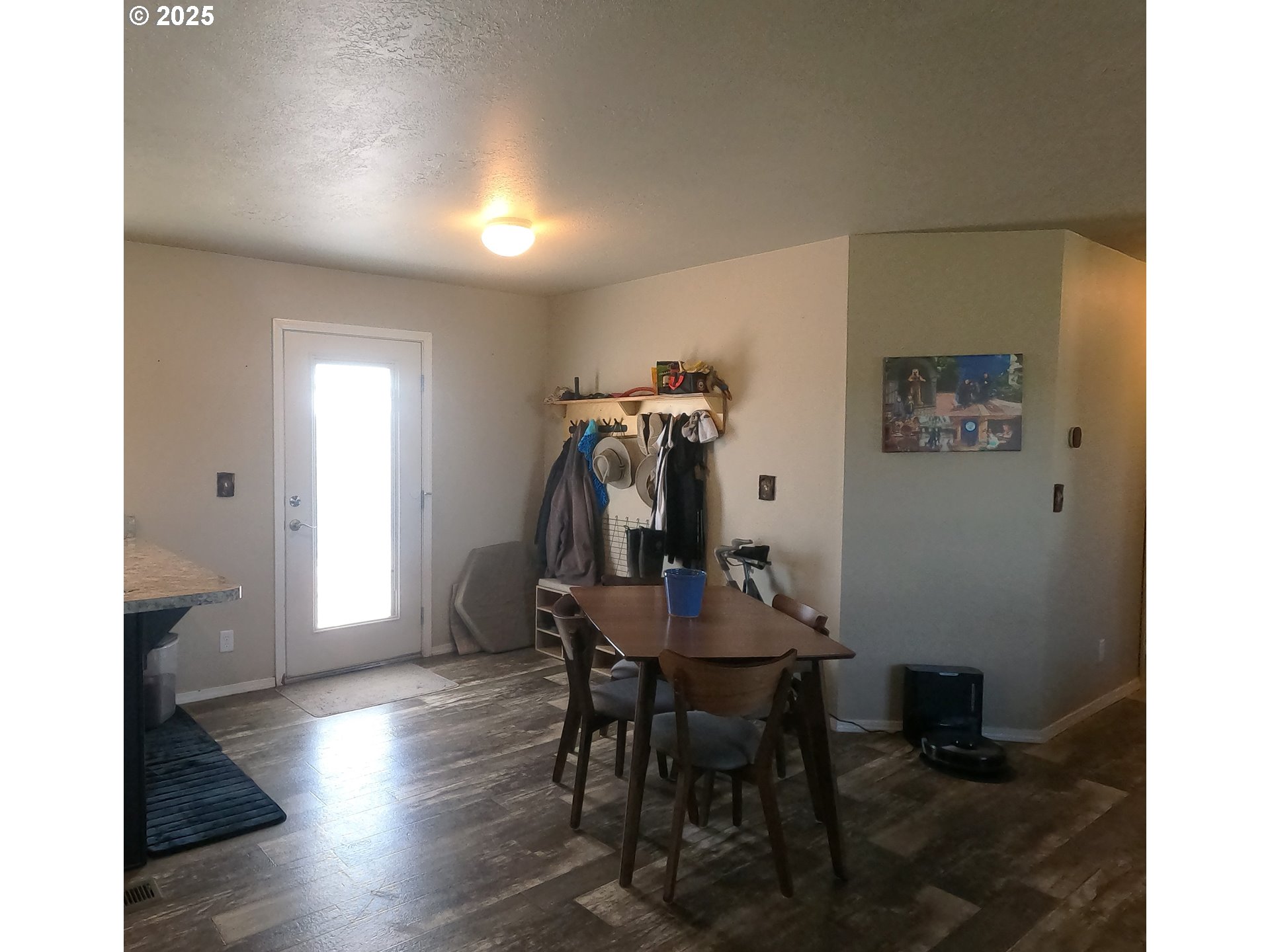 10500 Southwest Graham Road Culver, OR 97734 - Photo 14 of 34 a view of a dining room with furniture and wooden floor