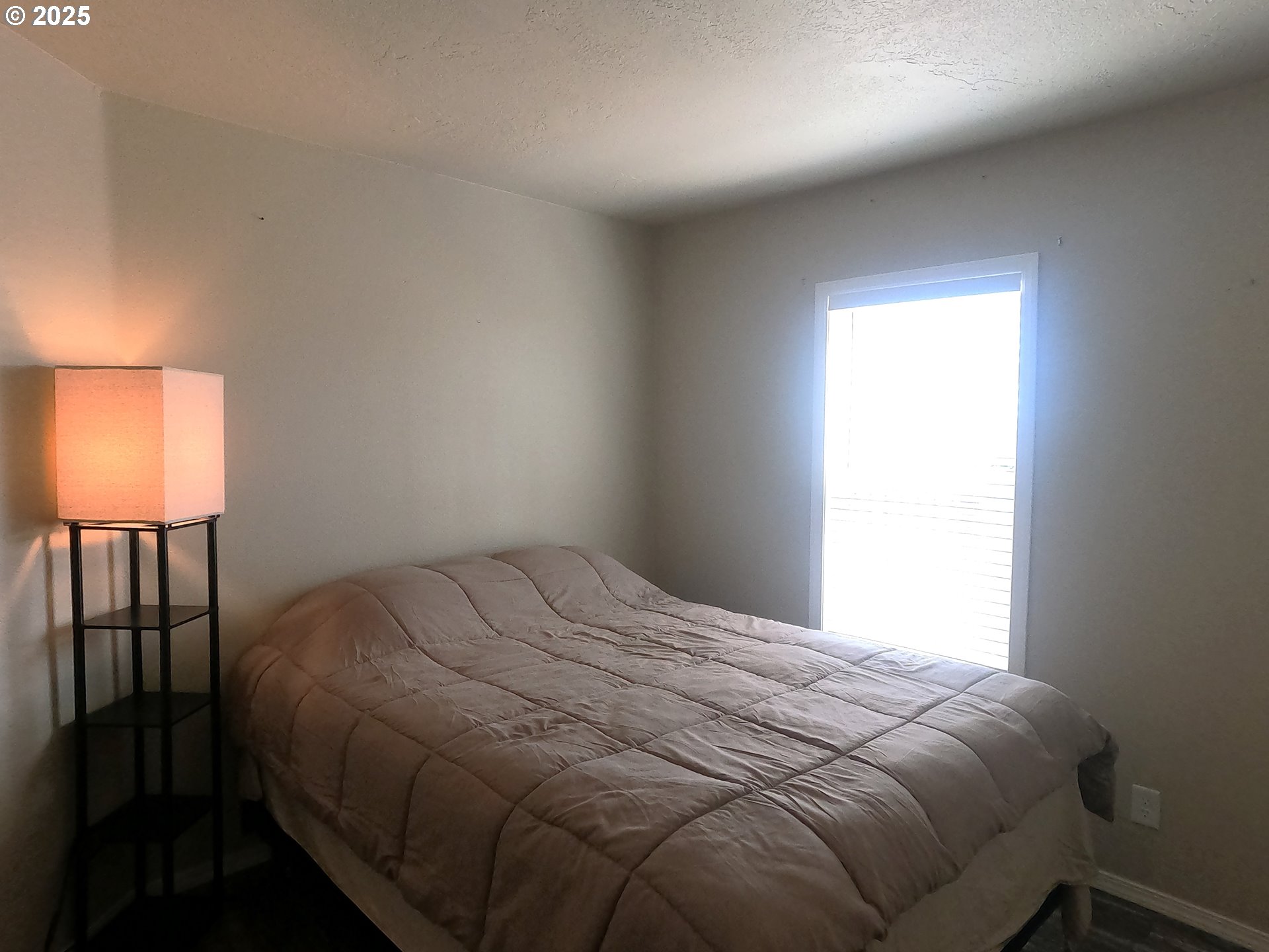 10500 Southwest Graham Road Culver, OR 97734 - Photo 26 of 34 a bedroom with a bed and a window