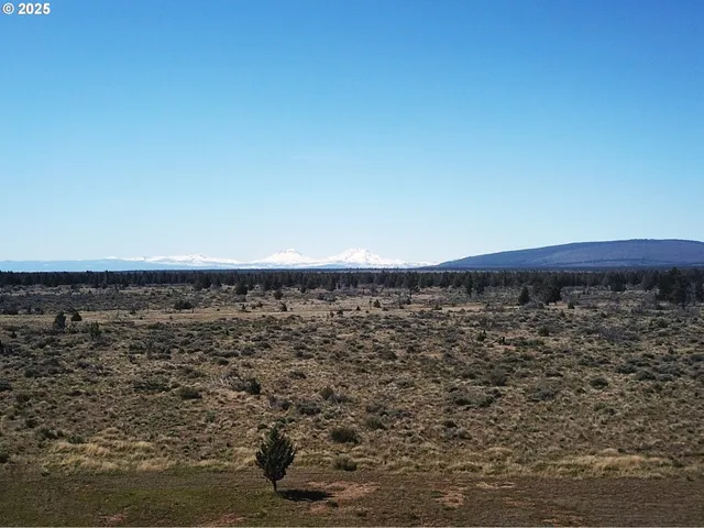 a view of a large building with beach