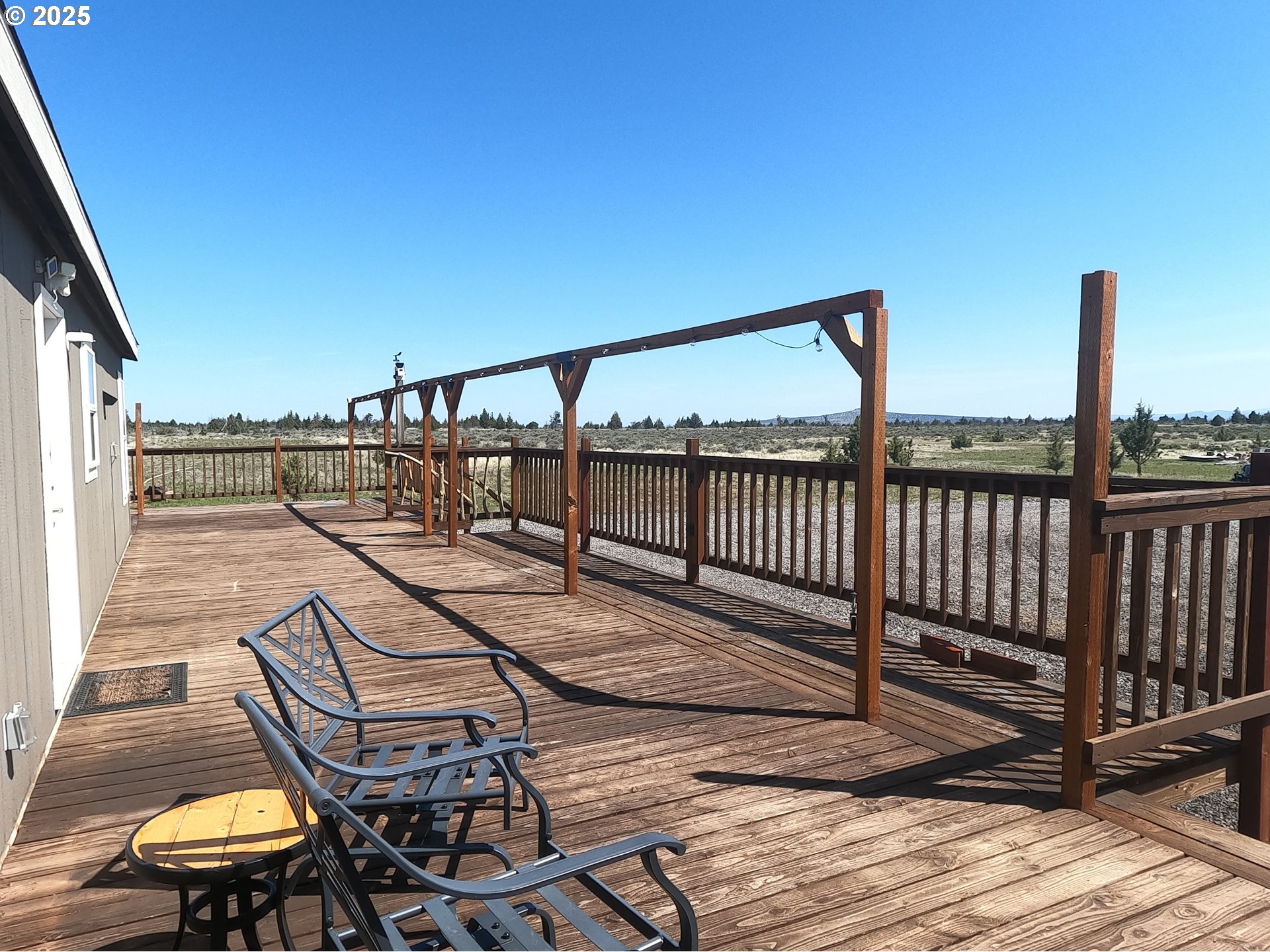 10500 Southwest Graham Road Culver, OR 97734 - Photo 7 of 34 a view of a balcony with chairs