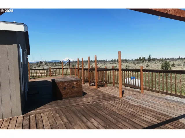 a view of balcony with furniture