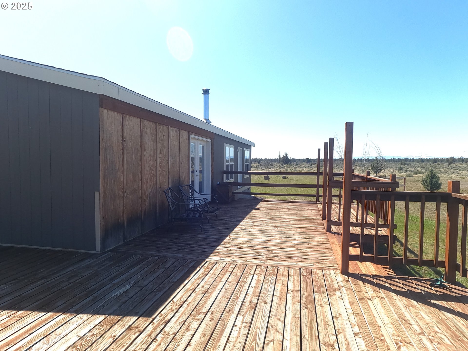 10500 Southwest Graham Road Culver, OR 97734 - Photo 10 of 34 a view of wooden balcony with outdoor space