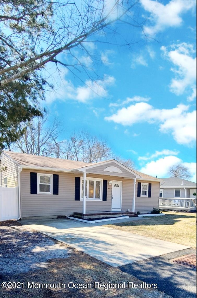34 Letts Landing Road Waretown, NJ 08758 - Photo 2 of 23 a view of a yard in front of the house