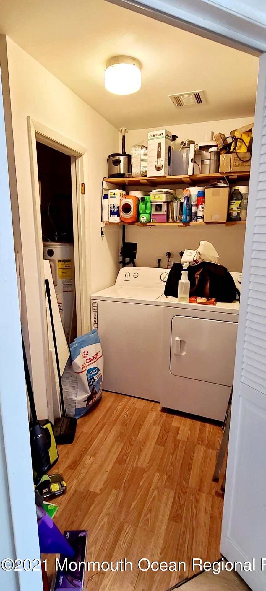 34 Letts Landing Road Waretown, NJ 08758 - Photo 13 of 23 a room with storage and utility