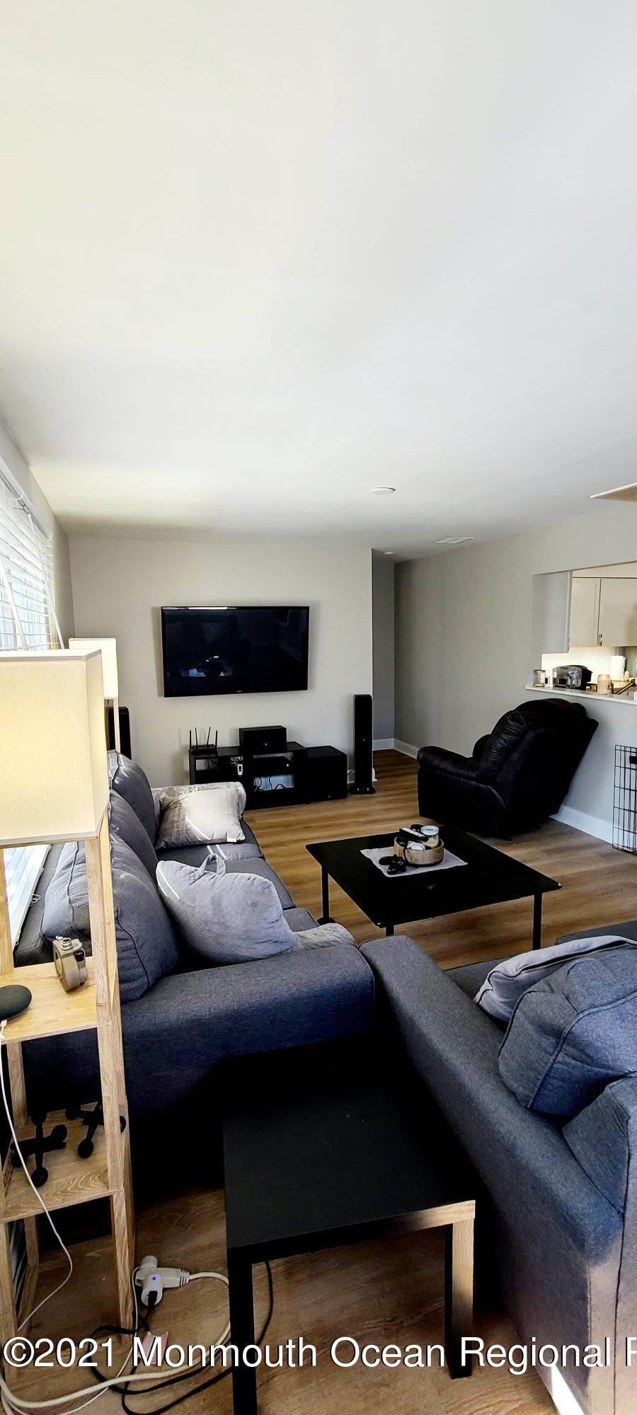 34 Letts Landing Road Waretown, NJ 08758 - Photo 17 of 23 a bedroom with furniture and a bed