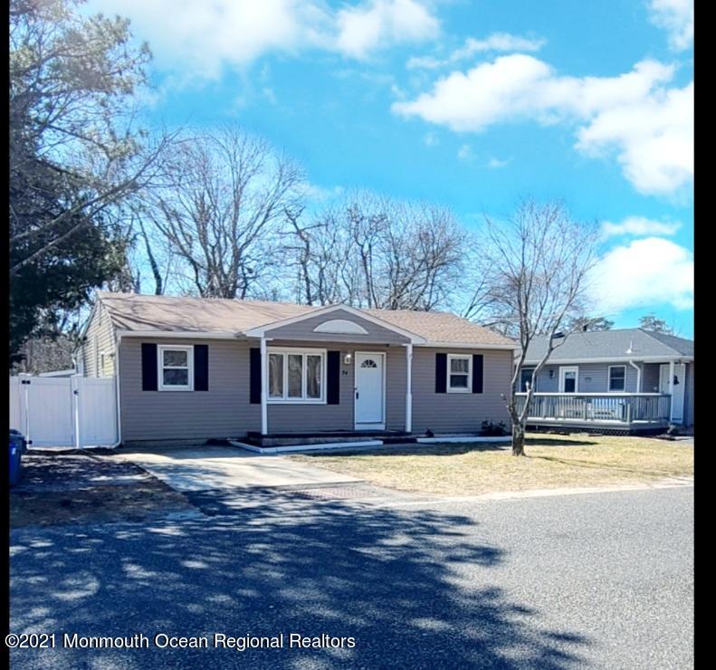 34 Letts Landing Road Waretown, NJ 08758 - Photo 3 of 23 a house view with swimming pool in front of it