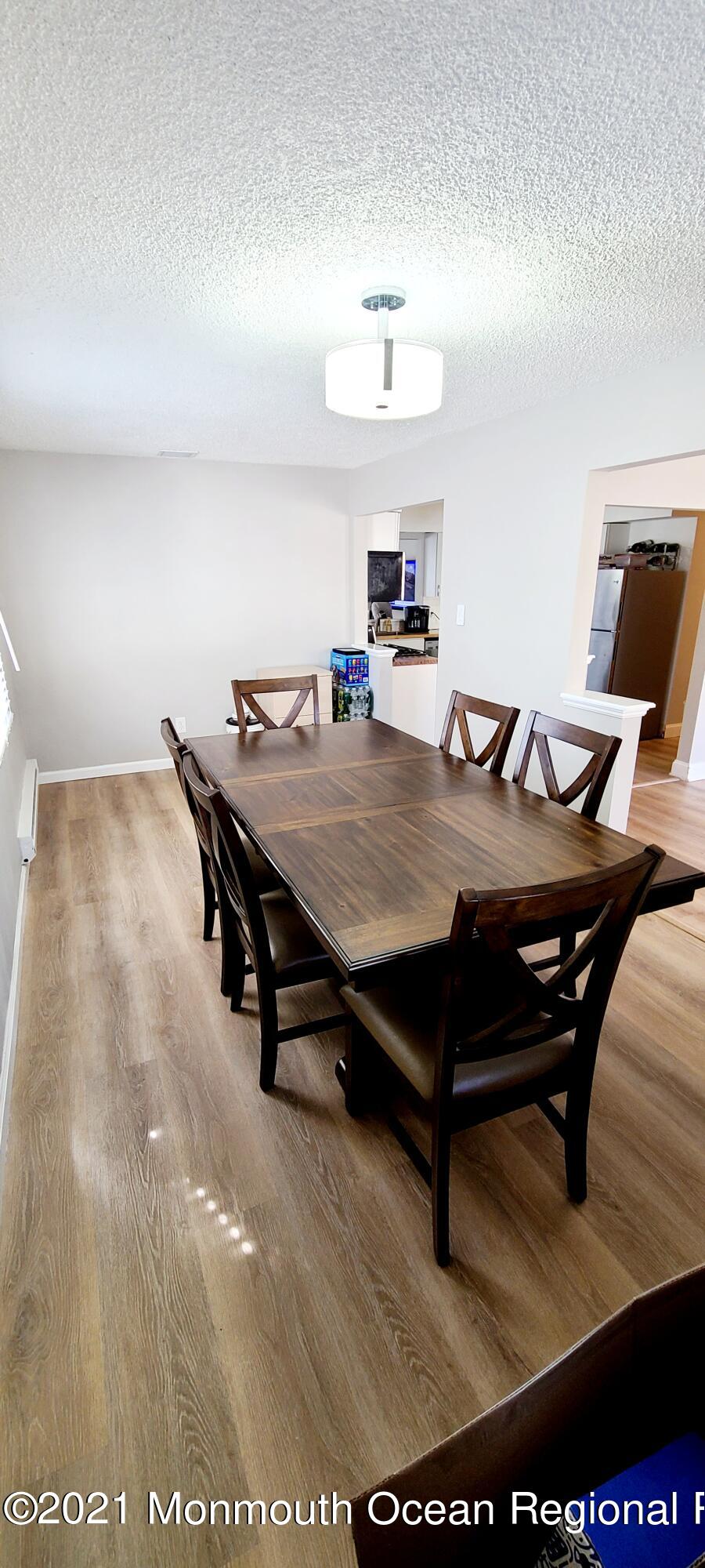 34 Letts Landing Road Waretown, NJ 08758 - Photo 8 of 23 a view of a dining room with furniture