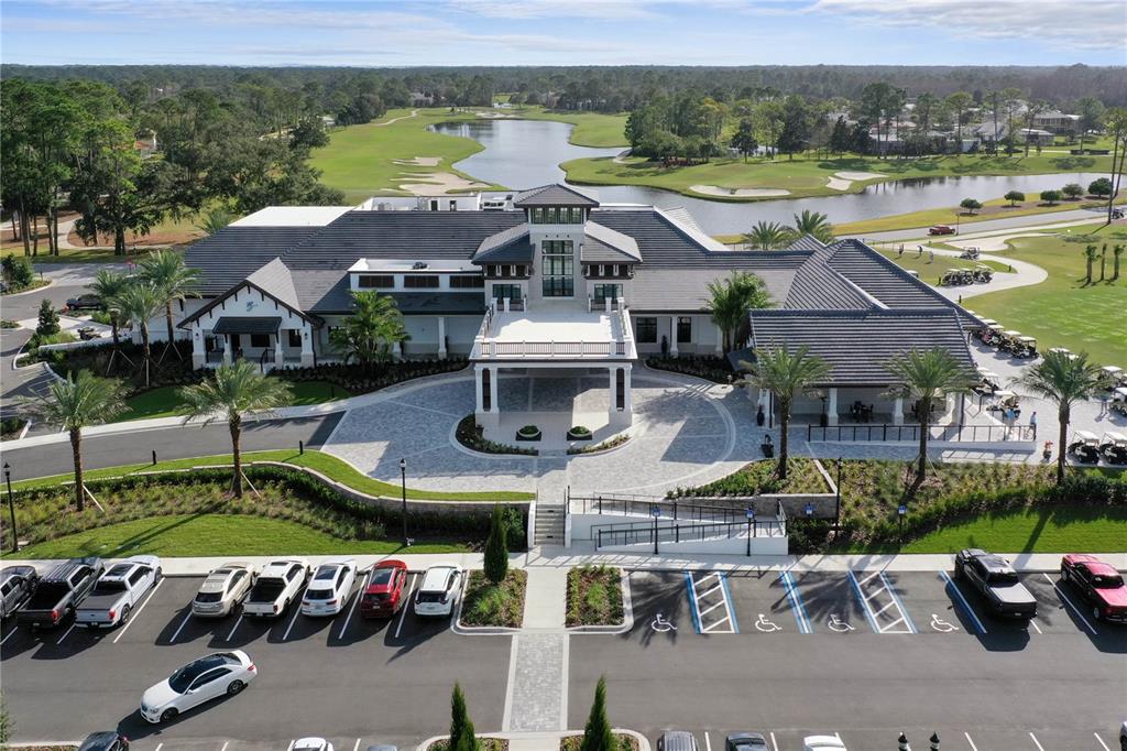 426 Long Cove Road Ormond Beach, FL 32174 - Photo 44 of 73 an aerial view of a house with garden space and ocean view