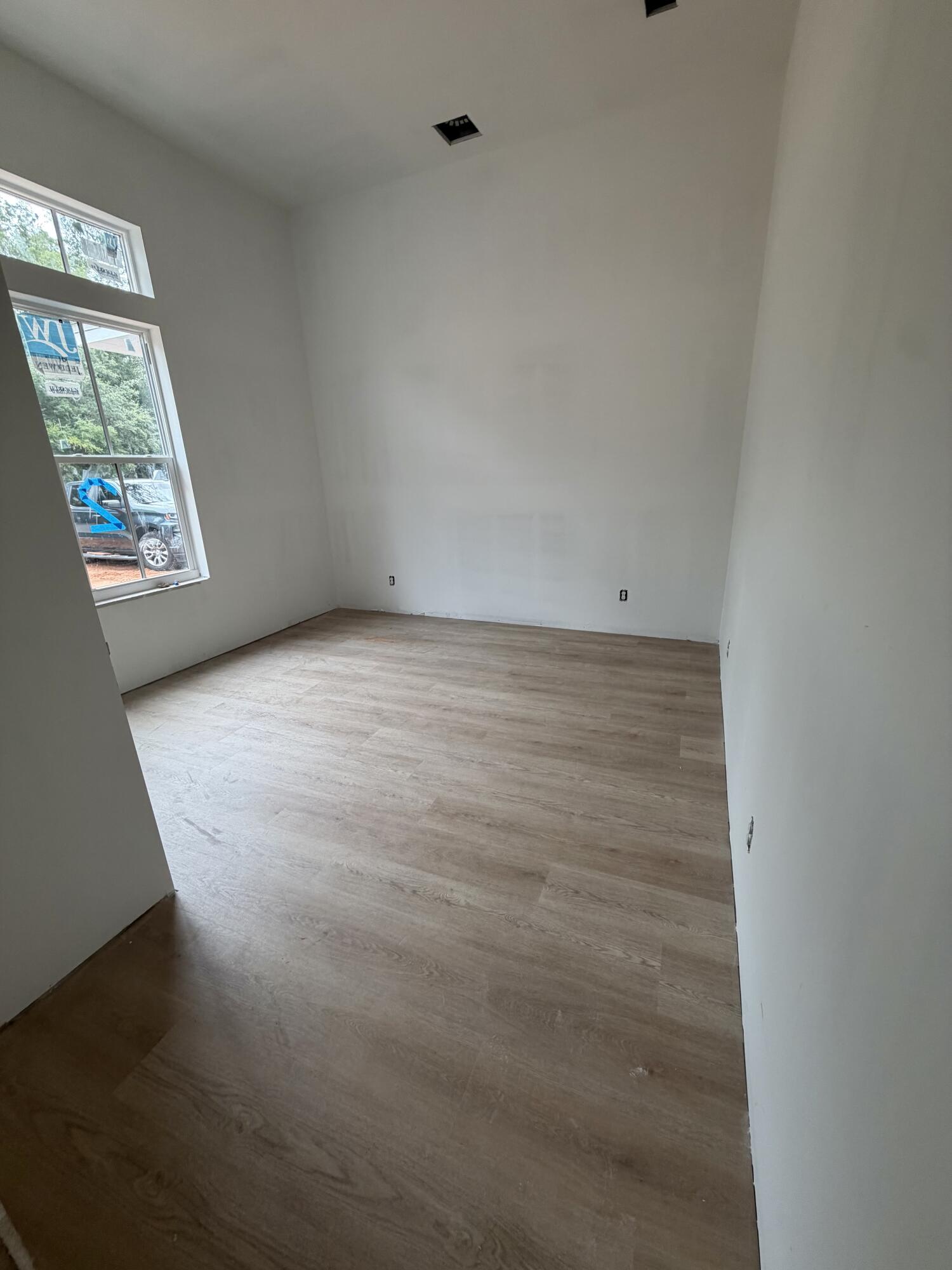 219 South J Hunter's Way, Unit LOT 73 Freeport, FL 32439 - Photo 8 of 10 a view of an empty room and window