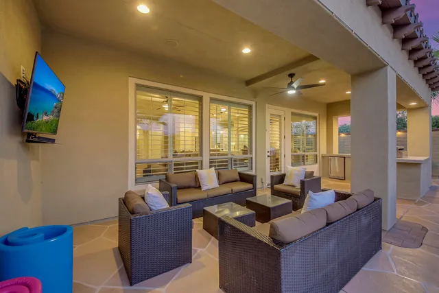 a view of a dining room with furniture window and outside view