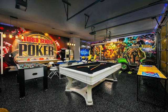 a view of a swimming pool with outdoor seating