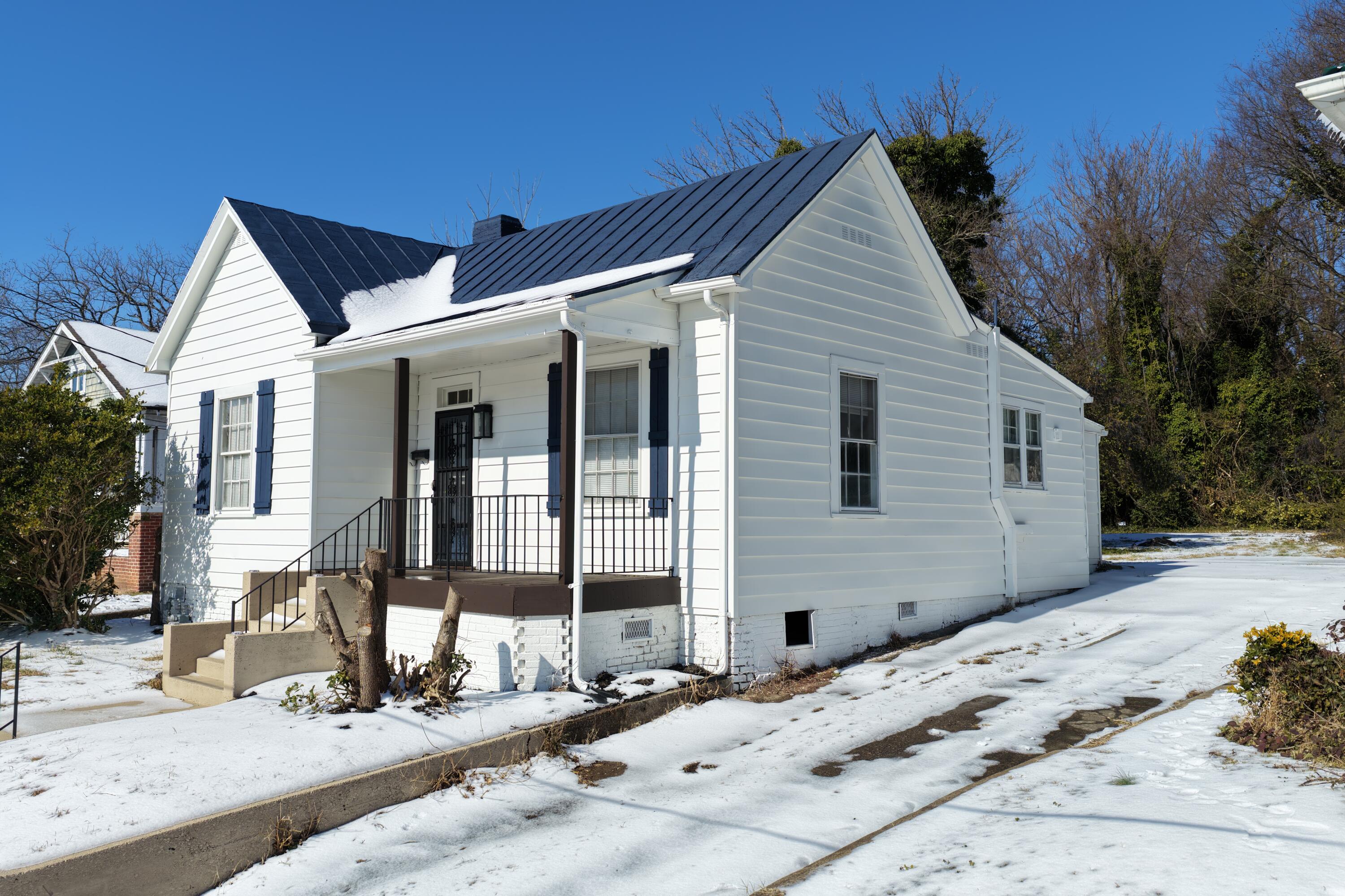 860 Stokes Street Danville, VA 24541 - Photo 2 of 32 a view of a house with a patio
