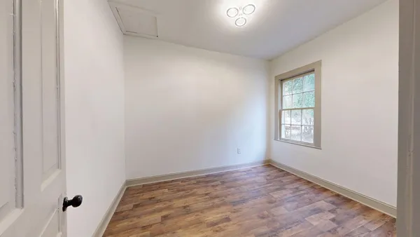 an empty room with windows