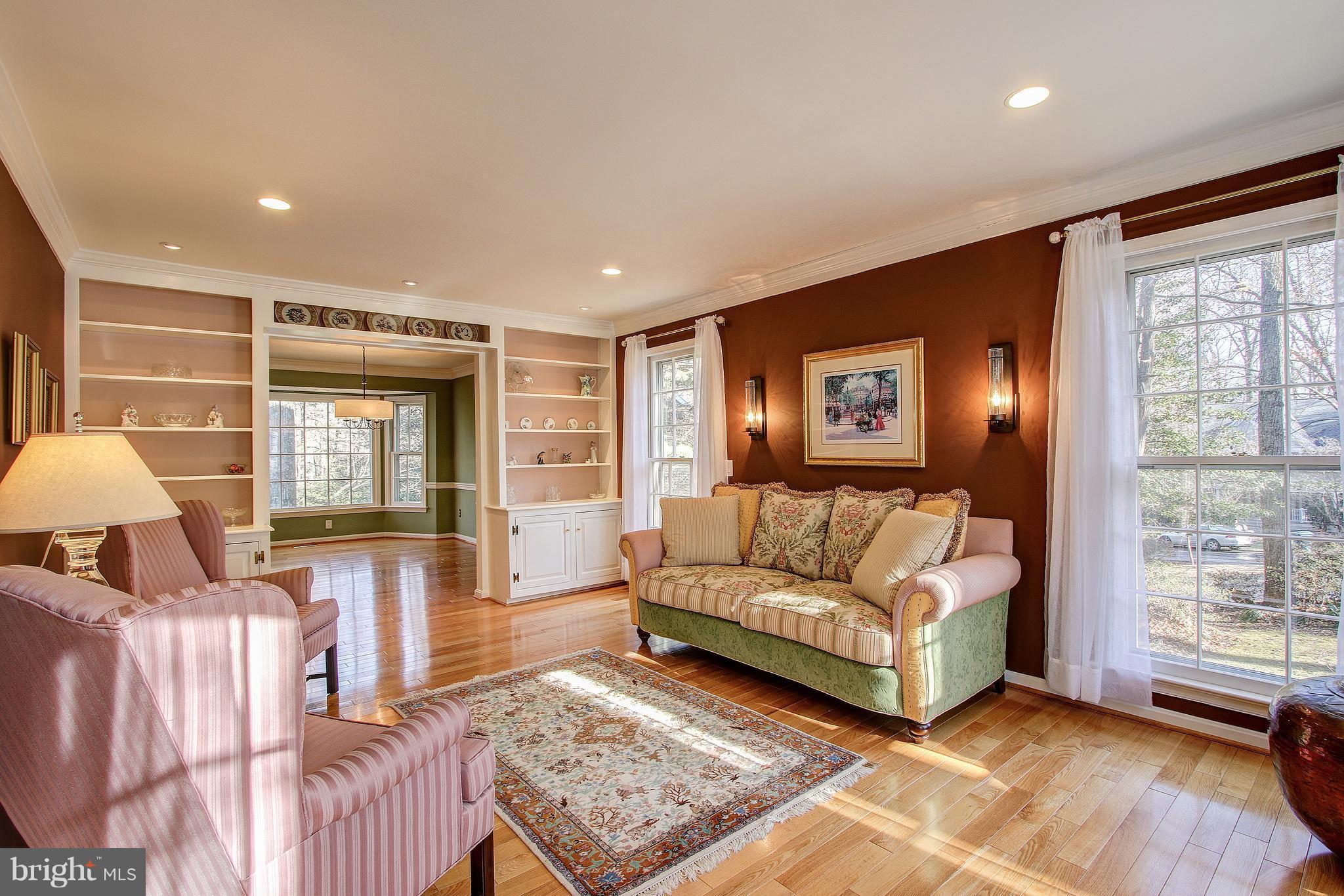 Living Room with built-ins and recessed lights!