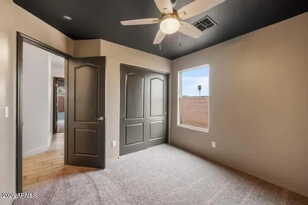a view of a hallway with a livingroom