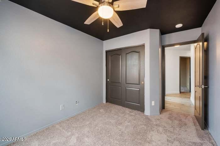 4130 East Chambers Street Phoenix, AZ 85040 - Photo 18 of 21 a view of a hallway with a chandelier fan