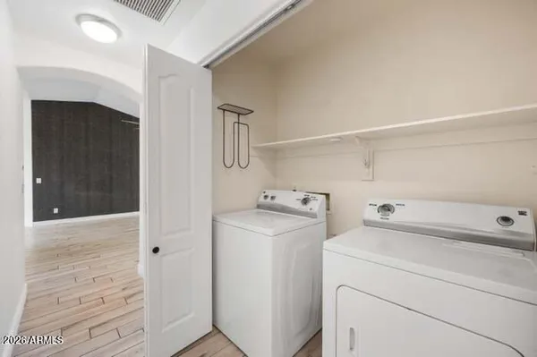 a utility room with dryer and washer