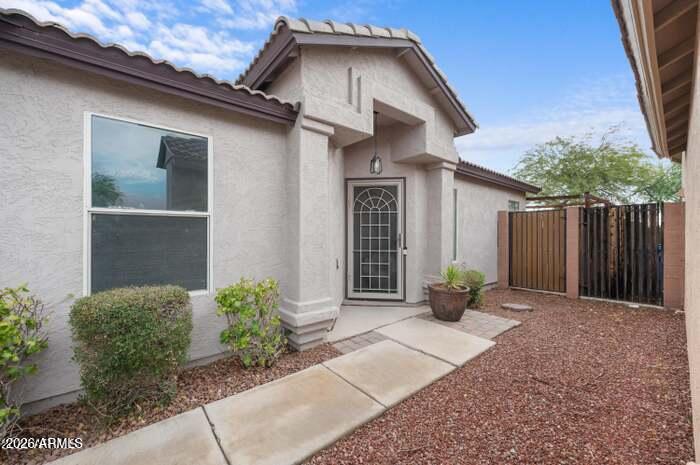 4130 East Chambers Street Phoenix, AZ 85040 - Photo 2 of 21 a front view of a house with garden