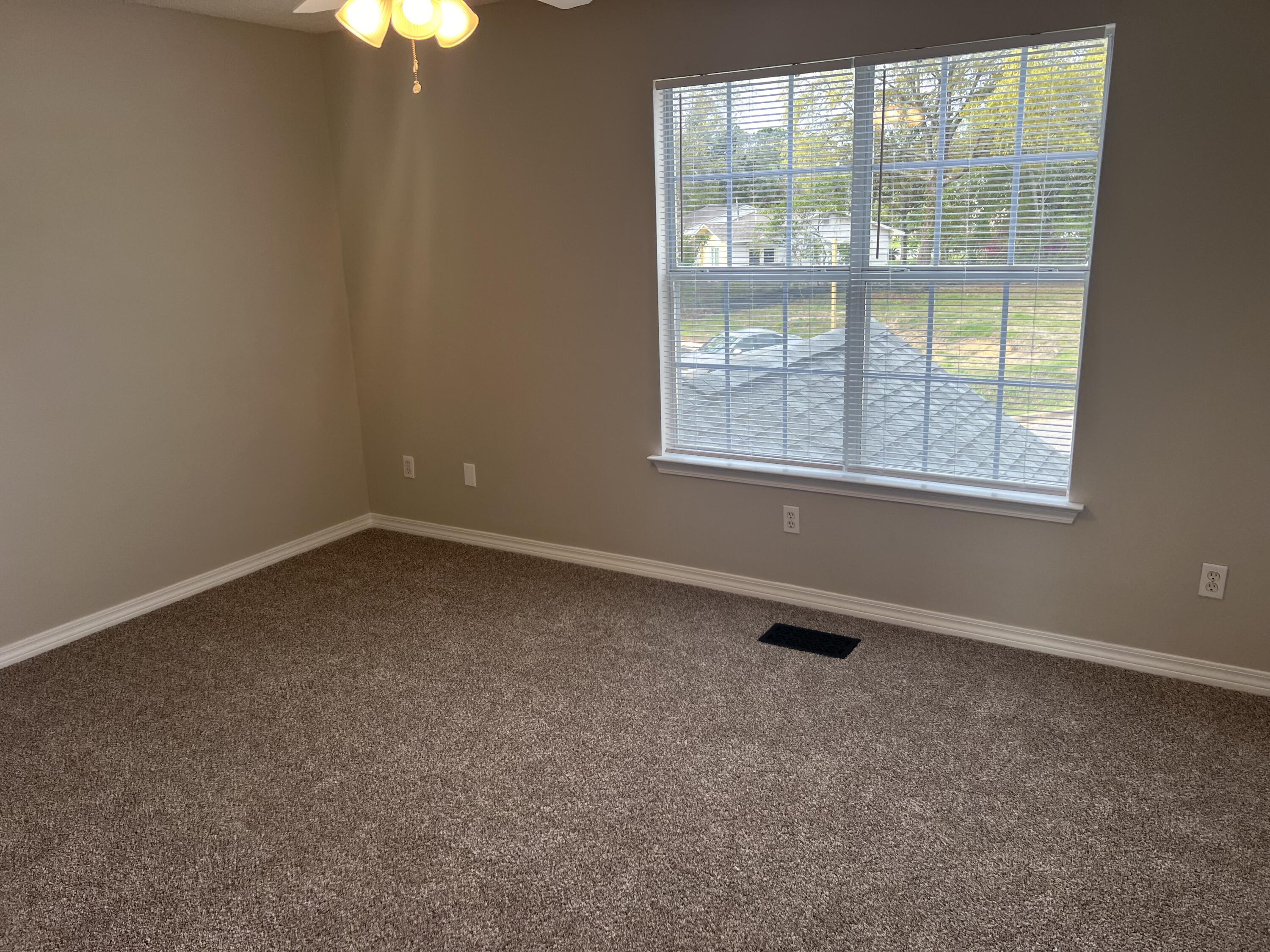 2263 Whitman Lane Fort Walton Beach, FL 32547 - Photo 7 of 7 an empty room with a window