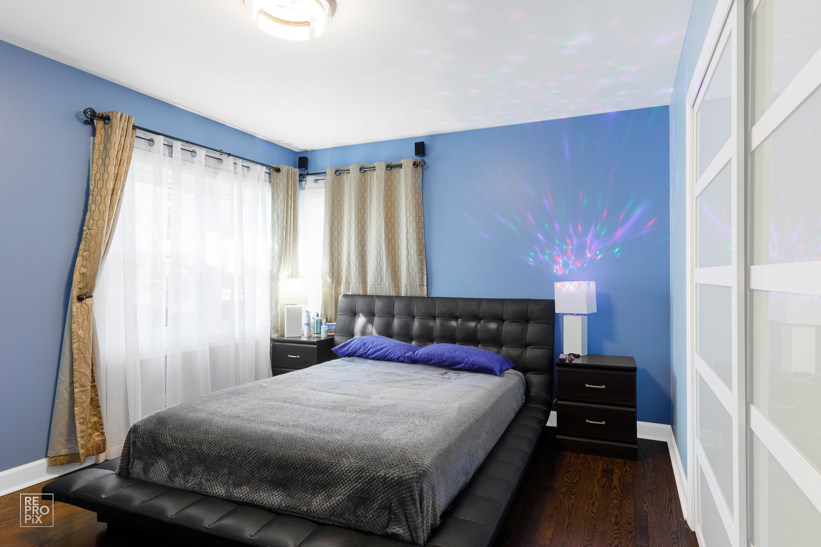 310 West Rand Road Mount Prospect, IL 60056 - Photo 12 of 26 a bedroom with a bed and a window