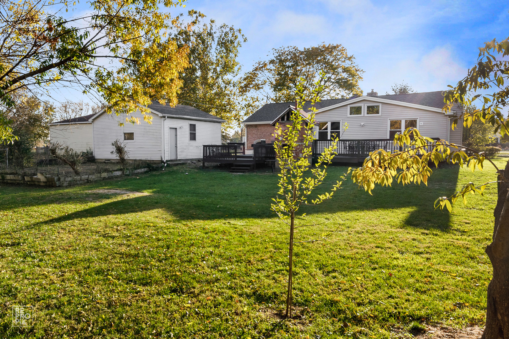 310 West Rand Road Mount Prospect, IL 60056 - Photo 23 of 26 a view of a house with a yard