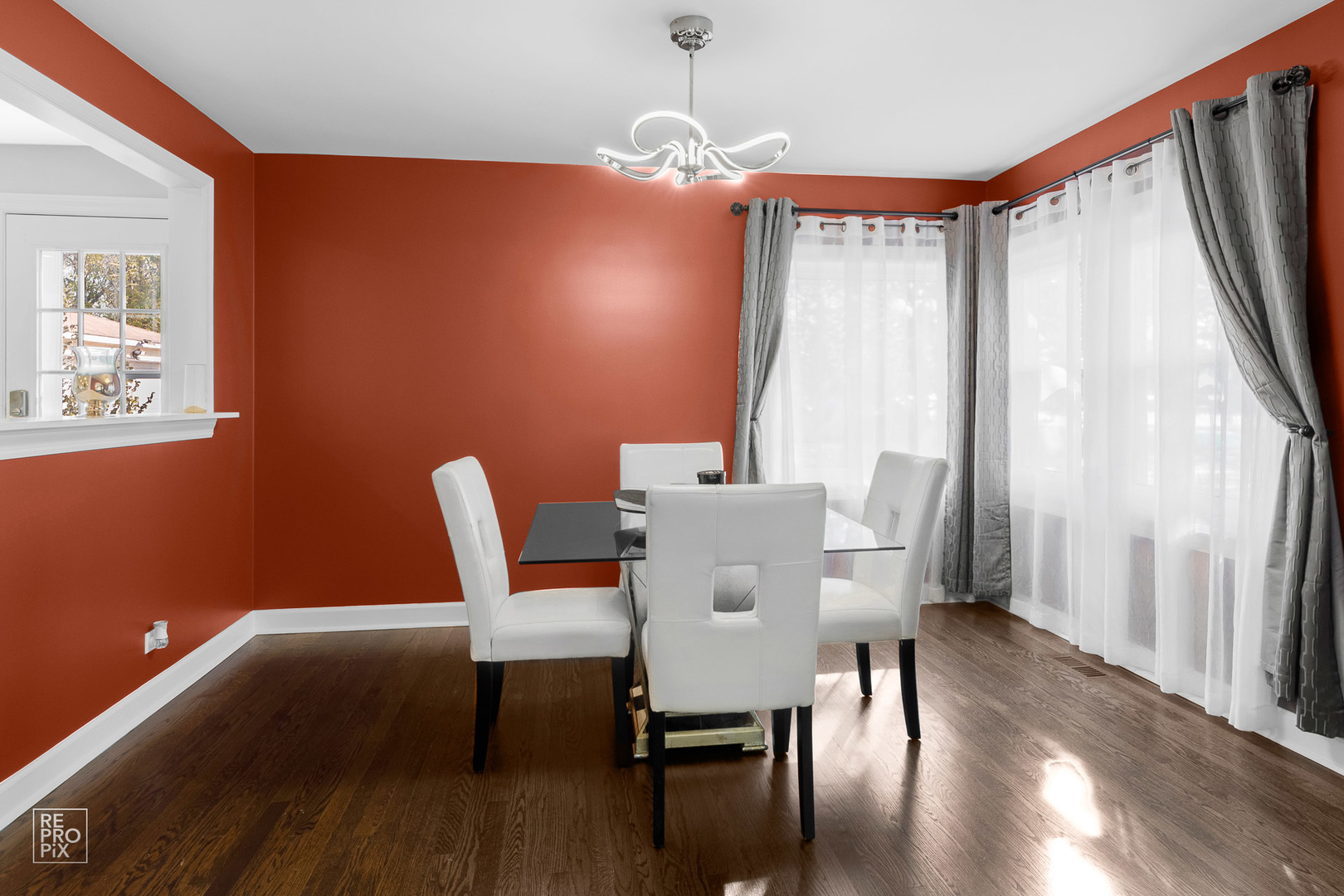 310 West Rand Road Mount Prospect, IL 60056 - Photo 5 of 26 a view of a dining room with furniture window and wooden floor
