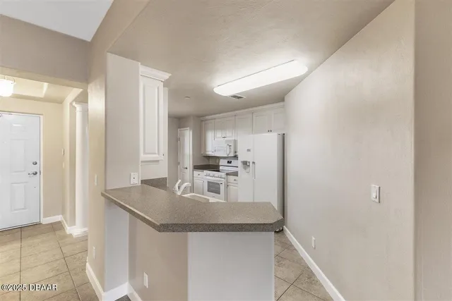 a bathroom with a double vanity sink mirror and double