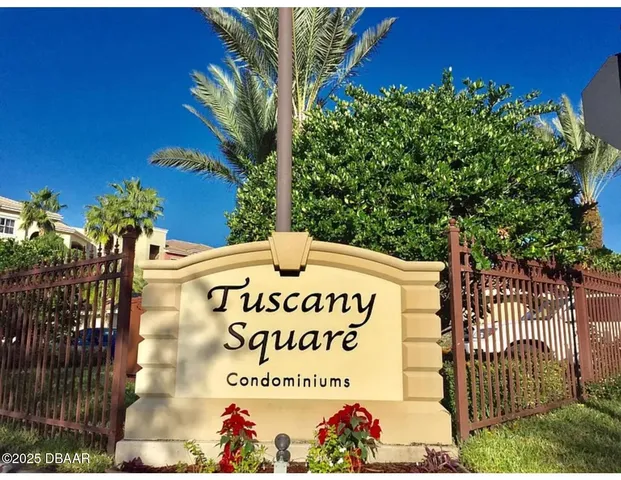 a view of an empty room and a window