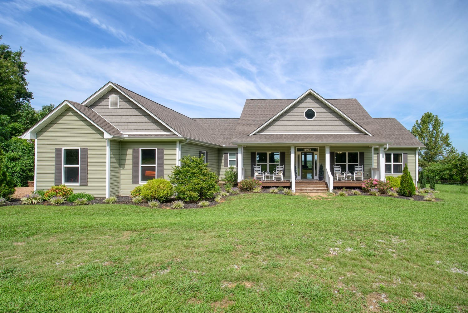 5088 Franklin Road Lebanon, TN 37090 - Photo 1 of 44 a front view of a house with a garden and porch