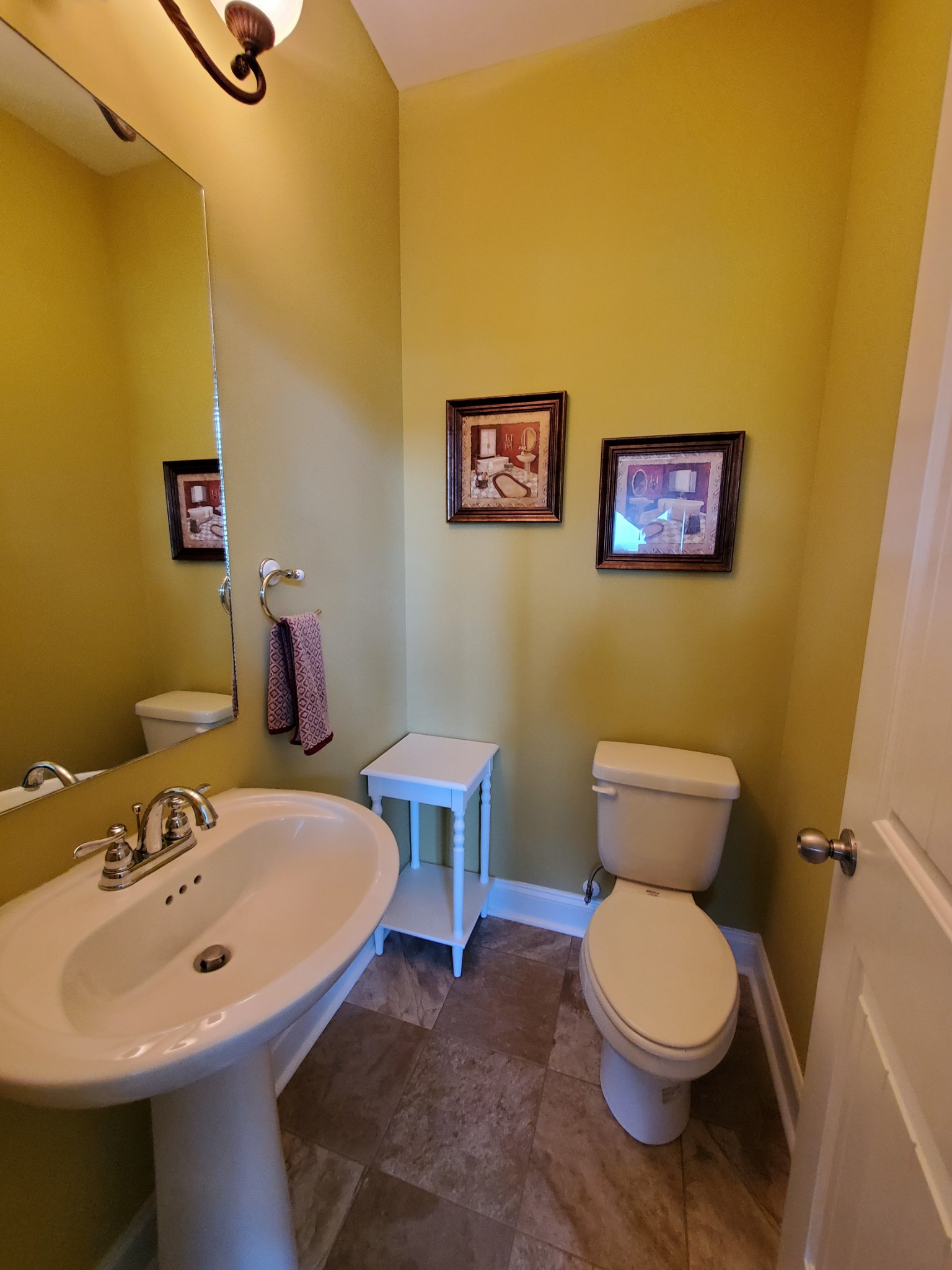 5088 Franklin Road Lebanon, TN 37090 - Photo 36 of 44 a bathroom with a sink mirror and toilet