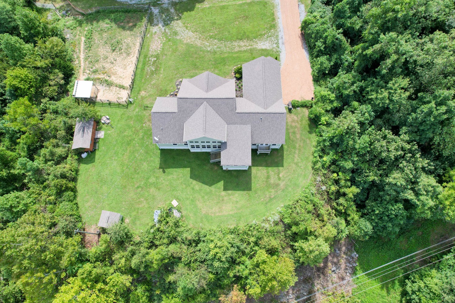 5088 Franklin Road Lebanon, TN 37090 - Photo 7 of 44 an aerial view of a house with swimming pool and garden