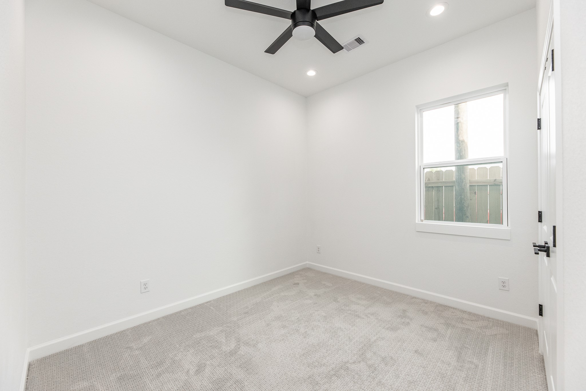 8502 Safeguard Street, Unit B Houston, TX 77051 - Photo 22 of 26 an empty room with a window